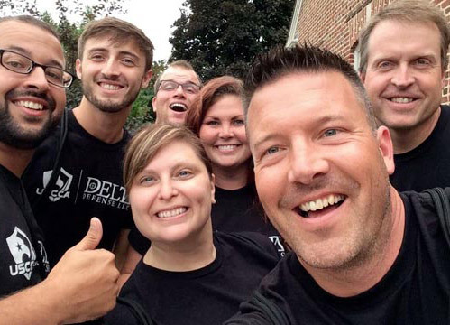 Delta Defense Employees having fun posing for the camera during team building exercises